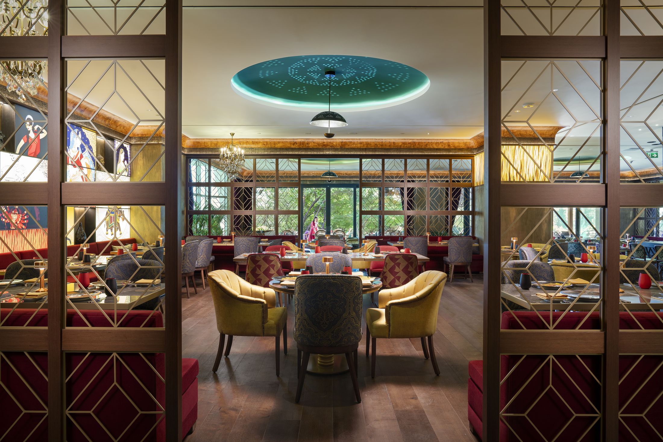 The main dining room at Madhu's Istanbul seen through brass lattice screens